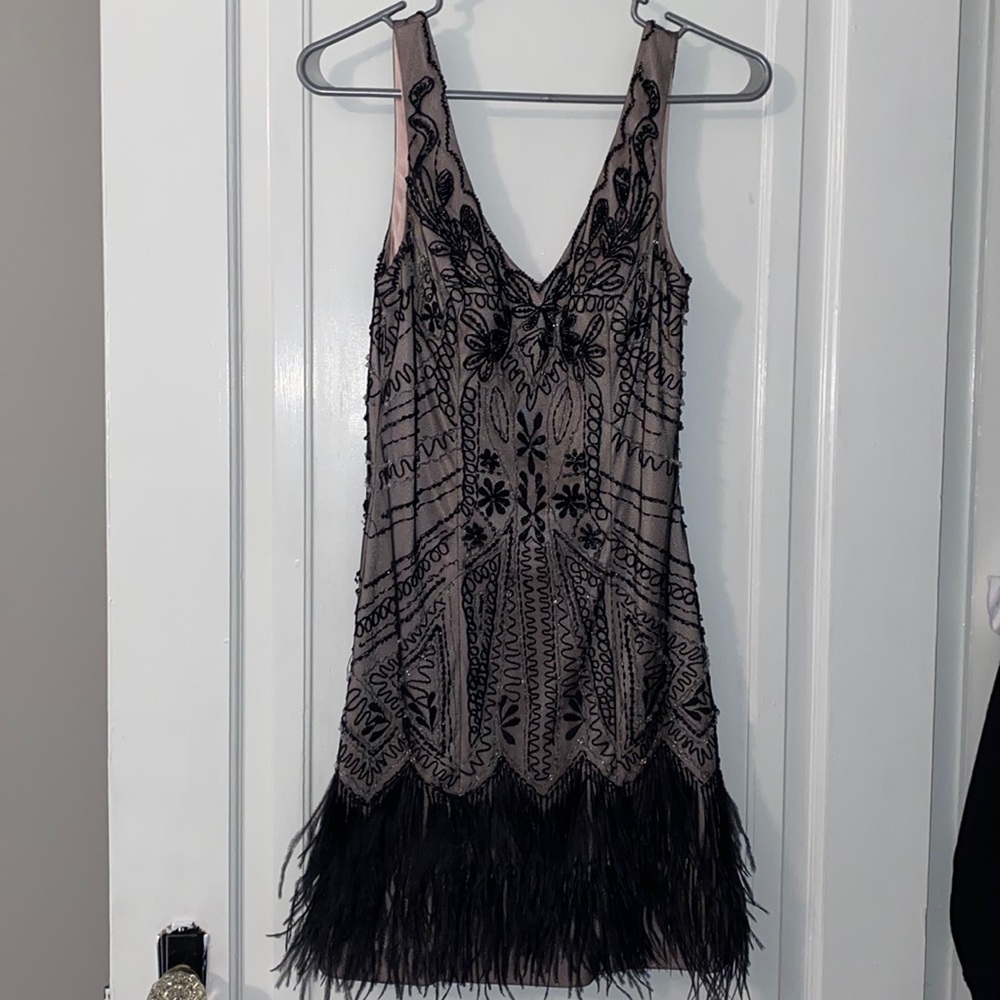 Classy dress, very interesting detailing.